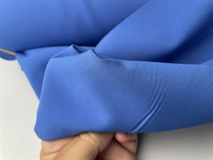 Fastvævet polyester med stræk - flot klar blå